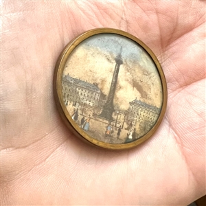 An 18th c. painting under glass of the Vendôme column (?) Paris, France.