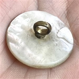 An 18th c. pearl with star motif, pastes and red paste center.