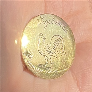 An 18th c. Flat engraved and gilded brass button of a rooster and “Vigilance. 