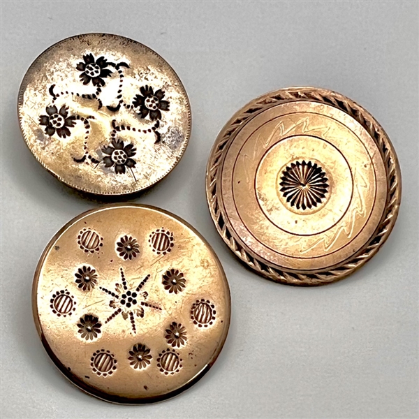 Three 18th c. chased copper colonial buttons.