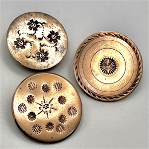 Three 18th c. chased copper colonial buttons.