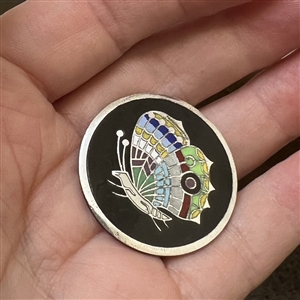 Champlevé enamel button of a butterfly.
