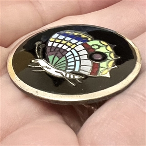 Champlevé enamel button of a butterfly.