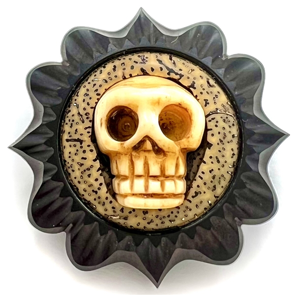 Skull and carved African blackwood studio button by Jon Sauer.