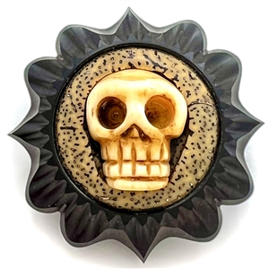 Skull and carved African blackwood studio button by Jon Sauer.