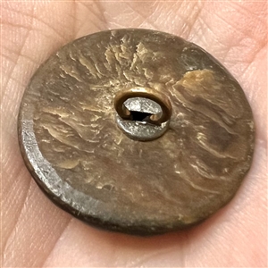 Brass and pearl button of Mary Queen of Scots.