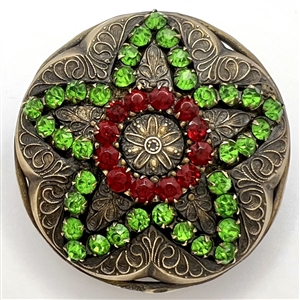 Huge brass jewel button of a star with green and red pastes.