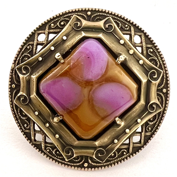 Gay 90s button with glass jewel center.