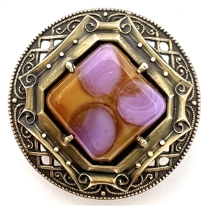 Gay 90's button with glass jewel center.