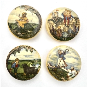 Four decoupage casein buttons of nursery rhymes.