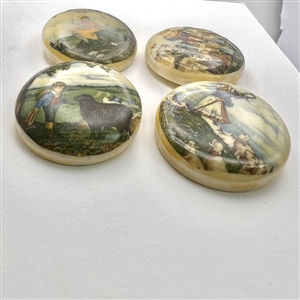 Four decoupage casein buttons of nursery rhymes.