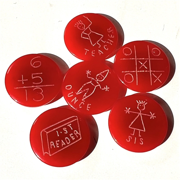 Set of six “School Days" red Bakelite buttons.