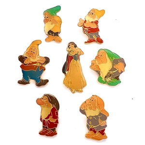 Set of seven buttons of Snow White and six Dwarfs.