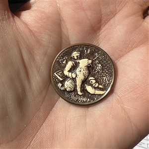 Ivoroid button of “The Barefoot Boy.