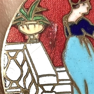 Champlevé enamel button of woman and man from the opera “Madame Sans Gene.