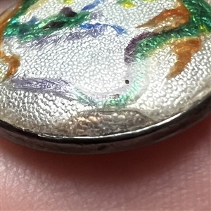 Japanese Gin bari foil enamel button of a green dragon set in silver.
