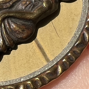 Brass button with painted background of Incroyable and Merveilleuse Fops. 